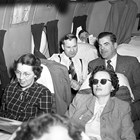 Ship of State.  Statehood group travels to Washington, D.C. in 1950 on board a DC4.  Senator Gunnard Enebreth and Bob Atwood sit behind two unidentified women.