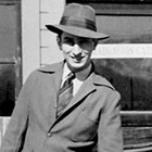 Jan Koslosky (1909-1991) in front of store.