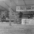 Eckmann’s Furniture booth at the 1917 Anchorage Fair, organized through the Alaskan Engineering Commission (AEC) to showcase local agriculture, industry, and commerce.  Christian "Chris" Eckmann was working for the AEC through much of this period; his wife, Louise Leonora, ran the store. 
