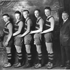 Two of Oscar Gill’s teenage sons, William and Victor, stand at the right of this photograph of the 1924 Anchorage High School boy's basketball team. Both graduated in 1925. 