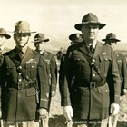 General Simon B. Buckner Jr. stands to the right of Lieut. General John L. DeWitt to inspect troops in Anchorage before the United States entered World War II.