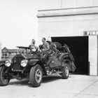 Moritz Andresen on the Anchorage Volunteer Fire Department fire truck, 1938.