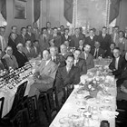 Anchorage businessmen chartered a flight to Washington, D.C. to petition for an international airport, June 22, 1946. Atwood is forth on the left (seated). Senator Ernest Gruening is at the far end of the right table and Senator Bob Bartlett is on his right.