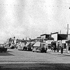 The sign for the D & D Cafe is visible in approximately the middle of the photograph. Balios operated this cafe from 1939 to 1942.