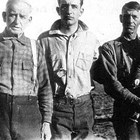 Four generations of Bartholfs, left to right:  William "Byron," grandson Chester, son John, and great-grandson Duane.