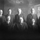 First Anchorage City Council, 1920. Seated, left to right: D. H. Williams, Ralph Moyer, Leopold David, Isidore "Ike" Bayles, and Frank Ivan Reed. Standing, left to right: John J. Longacre, Carl Martin, J. H. Conroy, Sherman Duggan, and A. C. Craig.