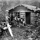 Nels Gustav ("Gust") Bystedt and a friend at Bird Creek mining claim, year unknown.