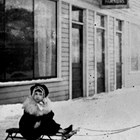 Ralph Courtnay and friend in front of Parsons Hotel, Anchorage, ca. 1920.