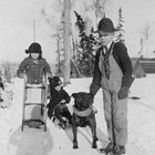 Ralph Courtnay and his dog, with Vanny Jones Courtnay and Vivian Jones on I Street, Anchorage, ca. 1917.