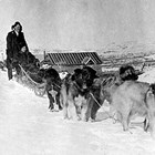 Arne and Josephine Erickson with dog team, Flat, Alaska, 1920.