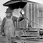Alaska Railroad section foreman Victor Johnson at Curry, Alaska with "Speeder," ca. 1925.