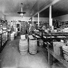 Irving Kimball in his Anchorage store, 1915.