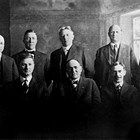 First city council, Anchorage, 1920. Left to right: A.C. Craig, Carl Martin (city engineer), Ralph Moyer, Joseph Conroy (city clerk), Leopold David (mayor), Sherman Duggan (attorney), John L. Longacre, Isidore "Ike" Bayles, Frank Ivan Reed, and D.H. Williams.
