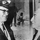 Carl Lottsfeldt with Alaska's U.S. Senator Ernest Gruening (right), discussing veterans' affairs.