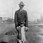 Paul Marsch and his daughter,Peggy, at 5th Avenue and K Street, Anchorage, 1925.