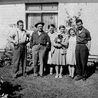 The Martin family at home, 626 D Street, Anchorage.  Left to right:  Carl Jr., Carl Sr., Lucille, Bonnie, Dorothy (Martin) Rogers and L. P. "Fuzz" Rogers.