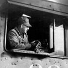 Thomas "Tom" Peterkin on Alaska Railroad Engine No. 620.