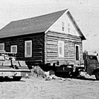 Moving the Peterkin homestead house, Anchorage, 1959.
