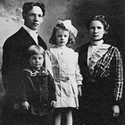 Father Edward, son Elmer (age two), daughter Evangeline (age five) and mother Jenny Rasmuson, in a 1911 family portrait.