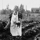Kristina "Christine" Seaburg tending her garden.
