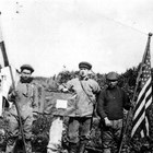 Harry Seller taking the U.S. 1910 Census on Kodiak Island with Native assistants, ca. 1910.