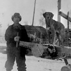 Engelhard "Ed" Sperstad cutting firewood, ca. 1935.