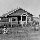 The Stoddard home at 8th Avenue and H Street, Anchorage, ca. 1925.