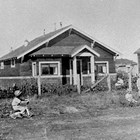 The Stoddard home at 8th Avenue and H Street, Anchorage, ca. 1925.