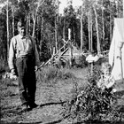 Oscar Tryck and one of his sons at a road camp, 1923.