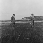 Nellie Brown with artist Sydney Laurence, possibly on shore near the Brown’s homestead near Green Lake, now on the Elmendorf Air Force Base bordering Anchorage. 1920s.  