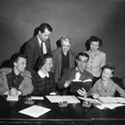 Members of the first board of directors of the Cook Inlet Historical Society when it was founded in 1955. Orah Dee Clark is the woman standing in the center of the photograph.
