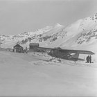 Star Air Service airplane making a supply run to a mine, possibly the Lucky Shot gold mine in the Willow Creek mining district.  Wesley Earl Dunkle provided important financial backing to the fledgling Star Air Service, which by the mid 1930s was one of the largest air service companies in Alaska.