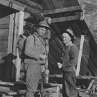 Colonel Frederick Mears (left) and fellow Alaskan Engineering Commission Commissioner Thomas W. Riggs, Jr. prepare to go hunting along the Alaska Railroad. Mears enjoyed hunting and fishing. Riggs served as territorial governor of Alaska from 1918-1921).