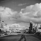 Anchorage 4th Avenue, ca. 1950, looking east, with the First National Bank sign on the right.  
