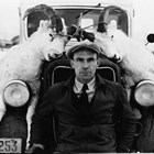 Thomas "Tom" Culhane enjoyed hunting. Here he is using one of Walt’s Transfer’s smaller vehicles to carry two Dall sheep that he had shot. ca. 1937-1945.