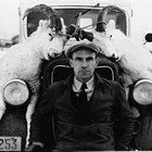 Thomas "Tom" Culhane enjoyed hunting.  Here he is using one of Walt’s Transfer’s smaller vehicles to carry two Dall sheep that he had shot.  ca. 1937-1945.