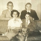 The four Culhane children: Back: John P. Culhane (left) and Thomas R. Culhane (right). Front (sitting): Marguerite R. Culhane, and Gerald J. Culhane.