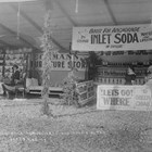 Eckmann’s Furniture booth at the 1917 Anchorage Fair, organized through the Alaskan Engineering Commission (AEC) to showcase local agriculture, industry, and commerce.  Christian "Chris" Eckmann was working for the AEC through much of this period; his wife, Louise Leonora, ran the store.