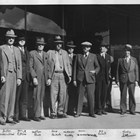 Thomas Price stands fourth from the left, next to author Rex Beach, along with several Anchorage notables including Dr. Howard Romig (first from the left).  Beach, who had been an unsuccessful Gold Rush miner, turned to writing novels about Alaska, including The Spoilers, about his experiences in Nome.  These were very popular, and Beach was well known.
