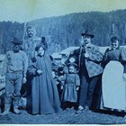 Martha White among the “Notables of the Sunrise Hotel” in 1898. Photograph taken during Captain Edwin F. Glenn’s expedition to Cook Inlet looking for a route into the interior gold fields. Martha White is the third person on the left; next to her is her young daughter, Martha "Babe" White.