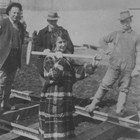 Martha’s daughter, named Martha after her mother but usually known as “Babe,” is shown here driving the first spike on a spur line of the Alaska Railroad on April 29, 1915. This line was built to carry supplies from tidewater at Ship Creek to where the railroad workshops were to be built.