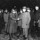 The greatly expanded freight demands on the Alaska Railroad during World War II led to several drastic improvements, particularly the construction of the Whittier Cut-off, two tunnels and the port of Whittier that brought freight substantially closer to Anchorage.  General Simon B. Buckner Jr. and Alaska Railroad General Manager Otto Ohlson are shown congratulating each other when the tunnels were connected on November 20, 1942. 