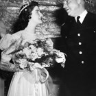 General Simon B. Buckner Jr. chats with Anchorage Fur Rendezvous queen Patricia Chisolm in February 1941.