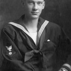 Russel Hyde Merrill in his U.S. Navy enlistee uniform in 1917 or 1918. Merrill initially served on an anti-submarine ship in the Atlantic; he later transferred to the U.S. Navy’s air arm.  After separating from the military he rejoined the naval reserves.